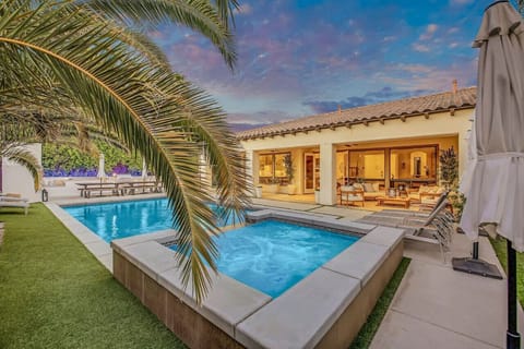 large beautiful heated pool and hot tub