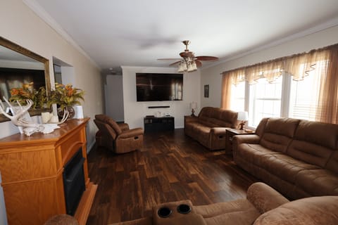 Spacious living room in Hocking Hills cabin—perfect for family gatherings and relaxation.