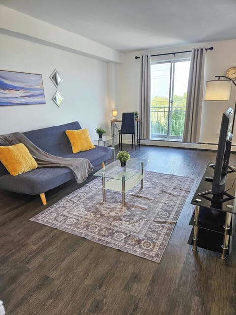 Spacious living room with patio access and smart TV