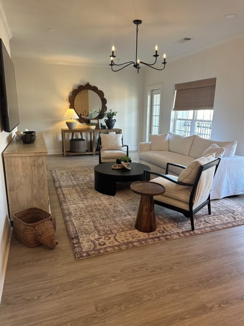 Family room with queen sleeper sofa and darkening shades for privacy. 