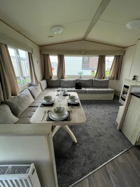 The living room in your caravan is the versatile heart of your holiday home, perfect for all kinds of getaways.