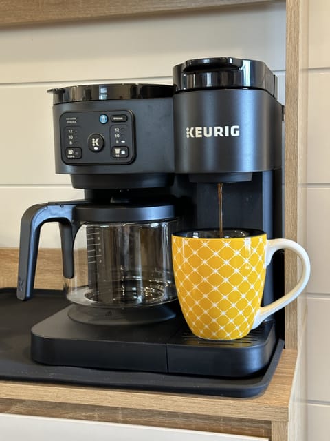 Brew a k-cup or a carafe of coffee and add sugar or creamer! All complimentary.