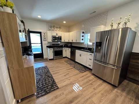 Coffee bar and fully stocked kitchen.