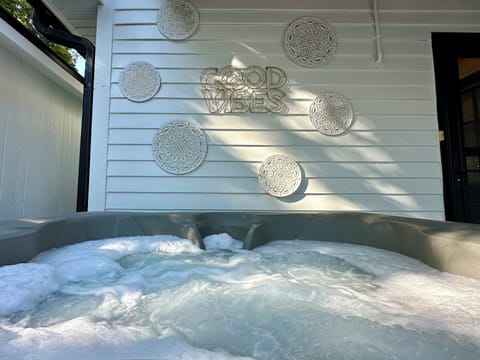 Slip into relaxation with a soak in the private hot tub. Open 24/7!
