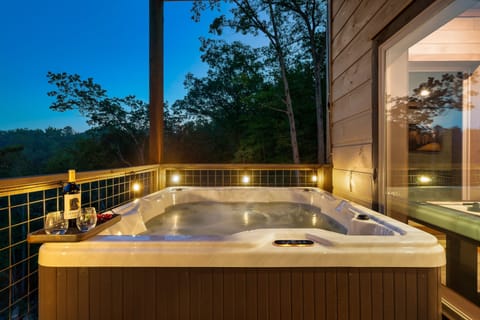 Hot tub on basement level to sip on drinks while enjoying the incredible view!