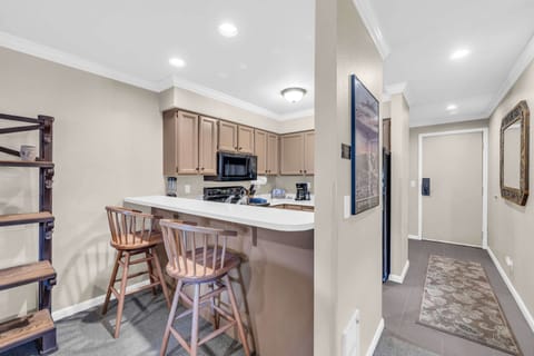 Kitchen: Well-equipped kitchen, updated appliances, drip coffee maker, kitchen island w/2 barstools
