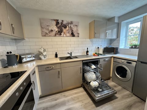 Fully equipped kitchen with appliances