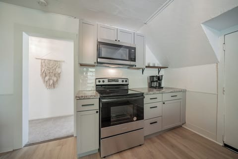 - Modern stove and appliances   - Clean counters ready for meal prep   - Bright kitchen space for easy cooking