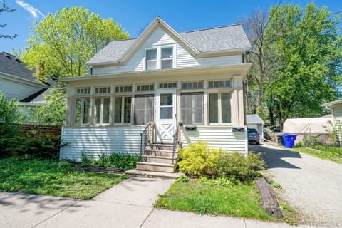 - Charming exterior in a quiet neighborhood   - Welcoming entrance with screened porch   - Peaceful location close to local hotspots