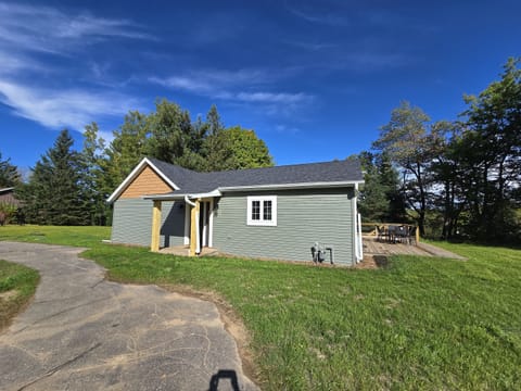 - Charming home exterior with fresh open yard views   - Peaceful setting offering privacy and easy access   - Ideal home base for relaxing stays and outdoor fun