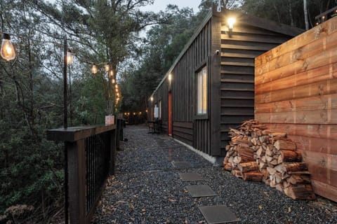 Firewood is readily available outside near the entrance, allowing you to keep the fire crackling and create a warm ambiance throughout your memorable stay.
