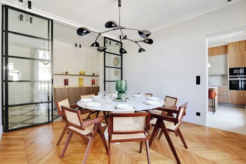 - A dining room with a table to seat 8 people.