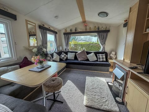 Discover the charm of Skegness in England with a stay at Parkdean Resorts Southview, where you can unwind in a cosy living room in a caravan after exploring the top things to do in Skegness.