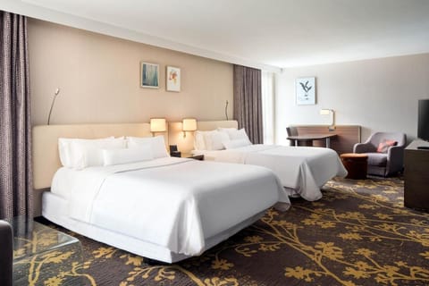 Wake refreshed in crisp linens and calming, spacious surroundings.