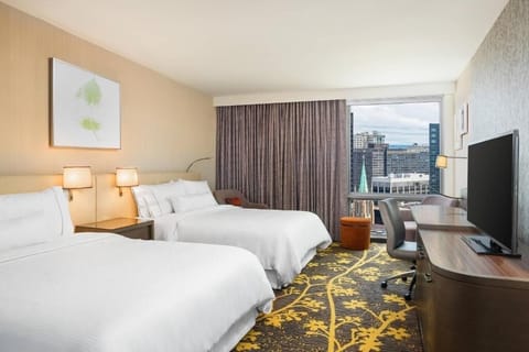 Settle into two cozy queens for effortless group stays.