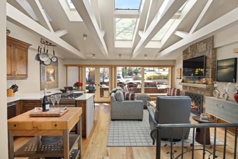 Enjoy the natural light from the vaulted skylight in the living room and kitchen