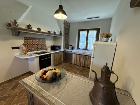 Property, Furniture, Cabinetry, Table, Countertop, Lighting, Interior Design, Wood, Flooring