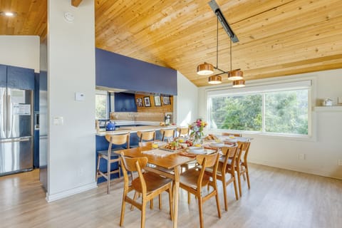 Spacious dining area and fully equipped kitchen.