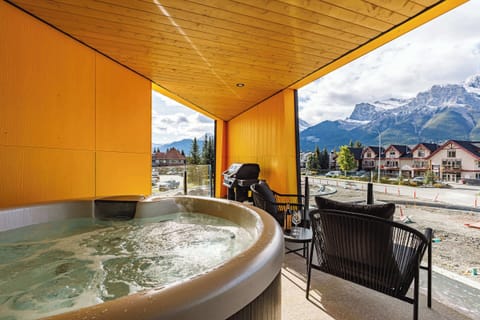 Enjoy your outdoor hot tub after a day of exploring.