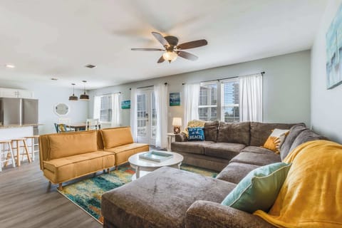 This open concept space has a spacious feel. The living room, dining room, and kitchen are all open to each other.