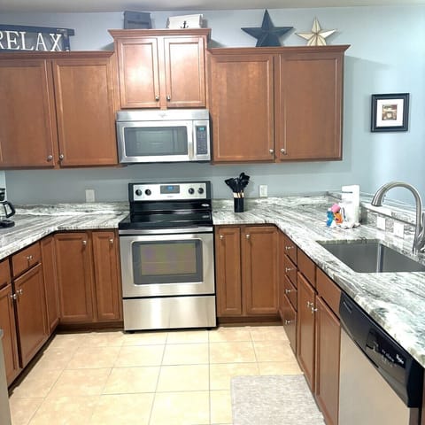 Kitchen- Enjoy Meals Inside The Condo Made From Your Fully Equipped Kitchen