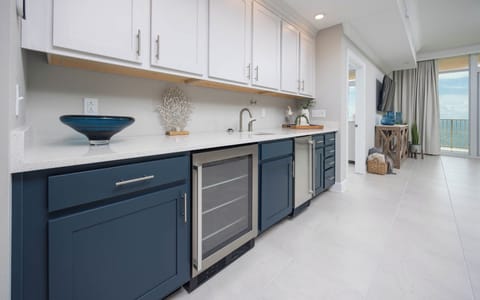 Grab a chilled bottle from the wine cooler or create your favorite cocktail at the wet bar