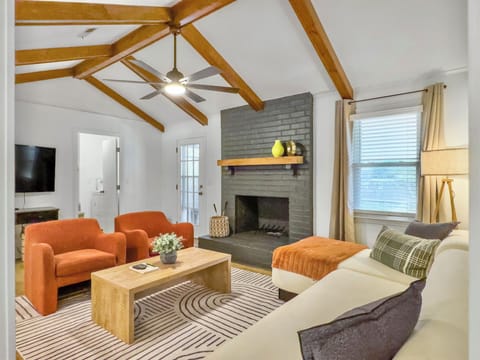 Enter the space through this gorgeous living room with tall ceilings