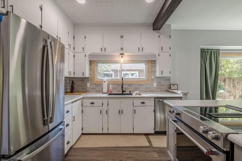 Cook up a storm in this fully equipped, modern kitchen — perfect for family meals or romantic dinners.