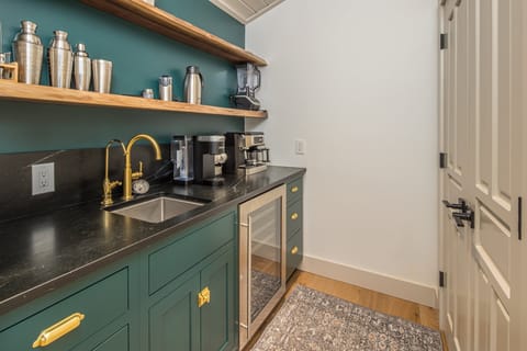 A dedicated coffee and cocktail bar stocked with everything needed to craft the perfect drink | Upper Level