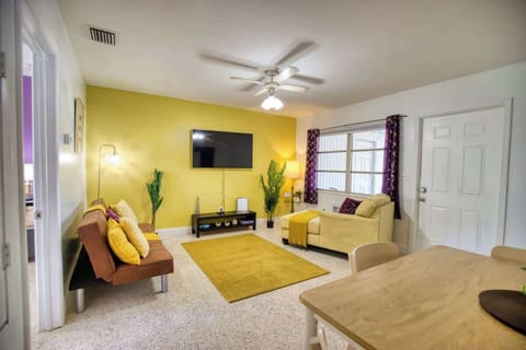 Relax and unwind in our bright, open living area. Perfect for family gatherings!