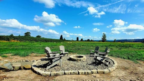 Enjoy a fire with scenic farmland views