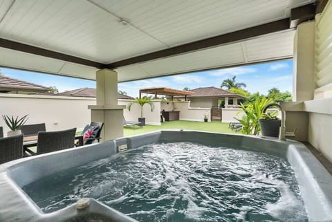 Immerse yourself in relaxation with a soothing hot tub experience, surrounded by invigorating outdoor breezes.