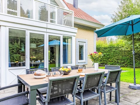 Cloud, Sky, Table, Plant, Furniture, Chair, Tableware, Building, Azure, Flowerpot