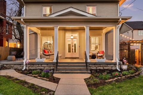 Unit 1: Stunning porch with outdoor seating.