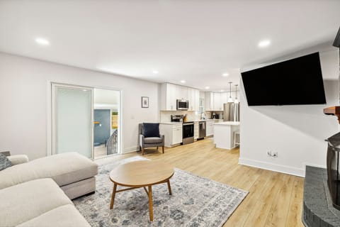 Spacious living room layout with ample seating for the whole group.