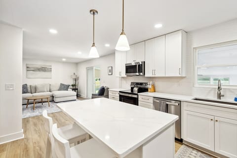 Gourmet kitchen with high-end appliances and ample counter space.