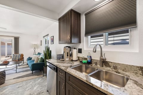 Kitchen angle highlighting generous counter space and stylish finishes that keep everything within reach.