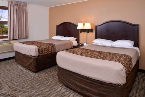 Unwind in crisp bedding and drift off in quiet comfort.