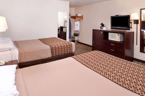 Recharge after a long day in a spacious, restful room.