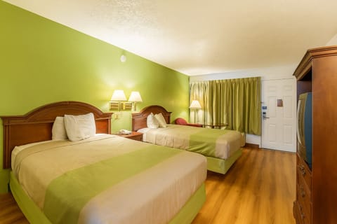 Relax together in a spacious two-bed room for easy sharing.