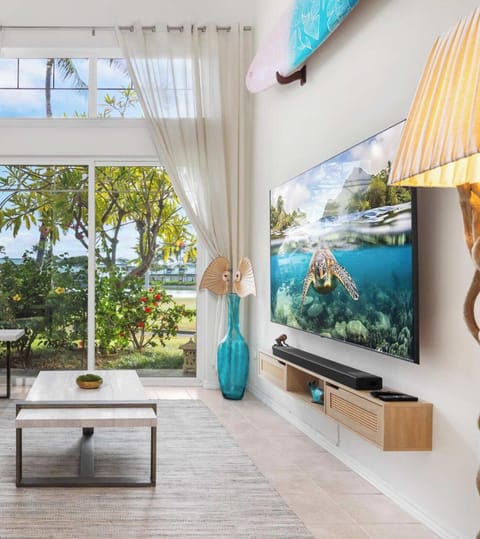 Hilton Pool Pass - FREE with stay for 6 adults (+ kids under 5) includes access to resort pools, lazy river, waterslides, hot tub, saltwater snorkeling lagoon, lounge chairs, towels, and parking for one vehicle.