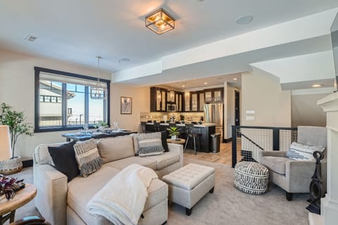 Cozy up by your crackling fireplace while winter views frame your elegant retreat, complete with plush seating and modern comforts.