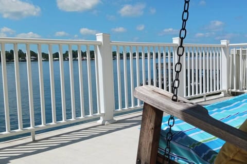 [Upper Sun Balcony] What is missing? Me, gently swinging to the beat with a glass of Sauvignon Blanc.