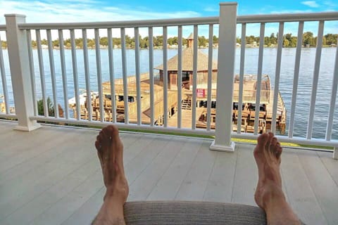 [Upper Sun Balcony] Grab a book from the lending library. Get a drink. Lounge in the afternoon shade!