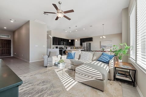 Living Room Oasis: Bright and airy space with stylish furniture and a cheerful ambiance!