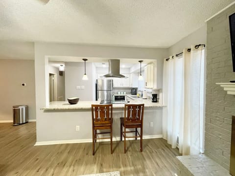View of kitchen from living room