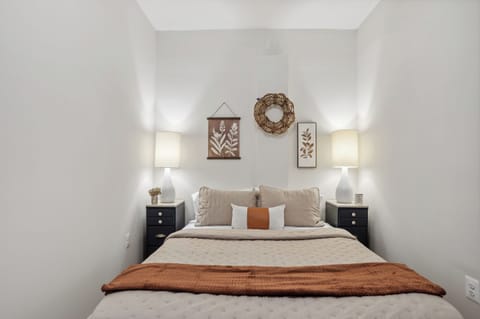 Queen bed in a peaceful retreat for restful nights and relaxing mornings