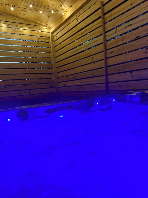 Relax in this  luxury hot tub! We drain, clean, refill & sanitize between guests