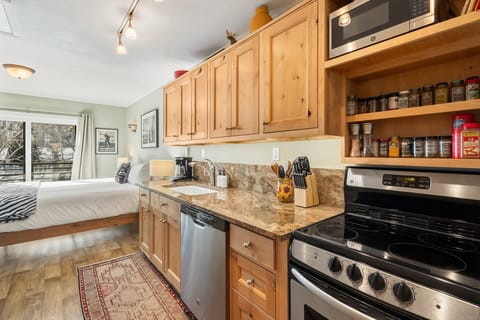 This suit features a fully stocked galley kitchen with full size refrigerator, oven, microwave and dishwasher.