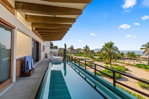 Relax on this spacious terrace with stunning ocean views and a private infinity pool, perfect for soaking up the sun.